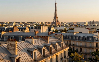 Paris rooftops and Eiffel Tower at golden hour - top city for meeting French singles