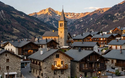 Escaldes-Engordany with the Caldea spa tower and Pyrenees mountains at dusk