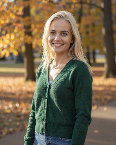 Saule, 27, Lithuanian woman with platinum blonde hair in a sunlit autumn park